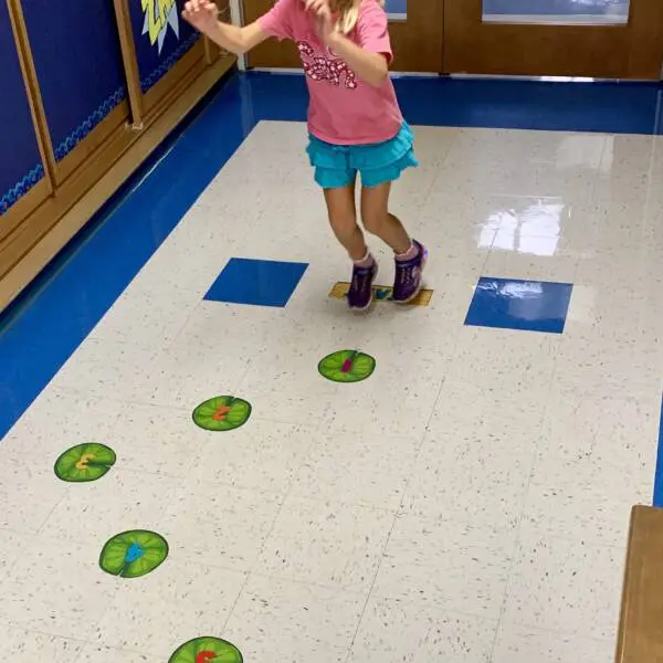 Child runs down sensory path