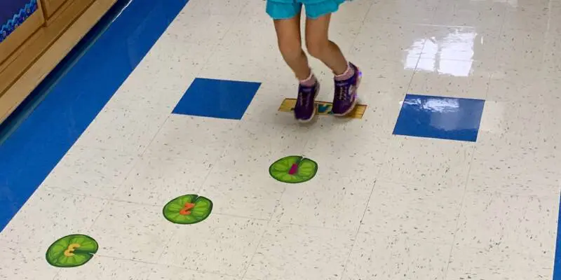 Child runs down sensory path